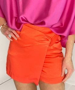 Glam Orange Front Twist Shorts Women's Clothing