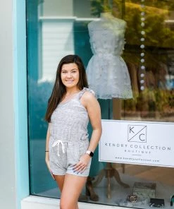 Hem & Thread Women's Clothing Navy Striped Ruffle Sleeve Romper