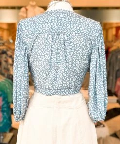 In The Beginning Women's Clothing Baby Blue Leopard Front Tie Top - RESTOCK